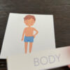 „Human body” – 10 Kart Pracy + 6 tablic z kartami trójdzielnymi + etui Kart Pracy Angielski Human Body dydaktyczny